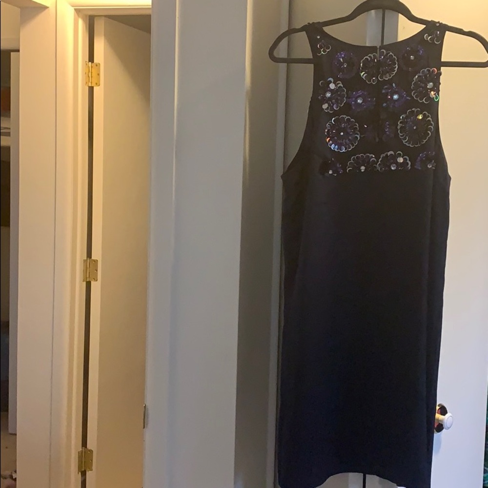 Navy blue silky shift dress .